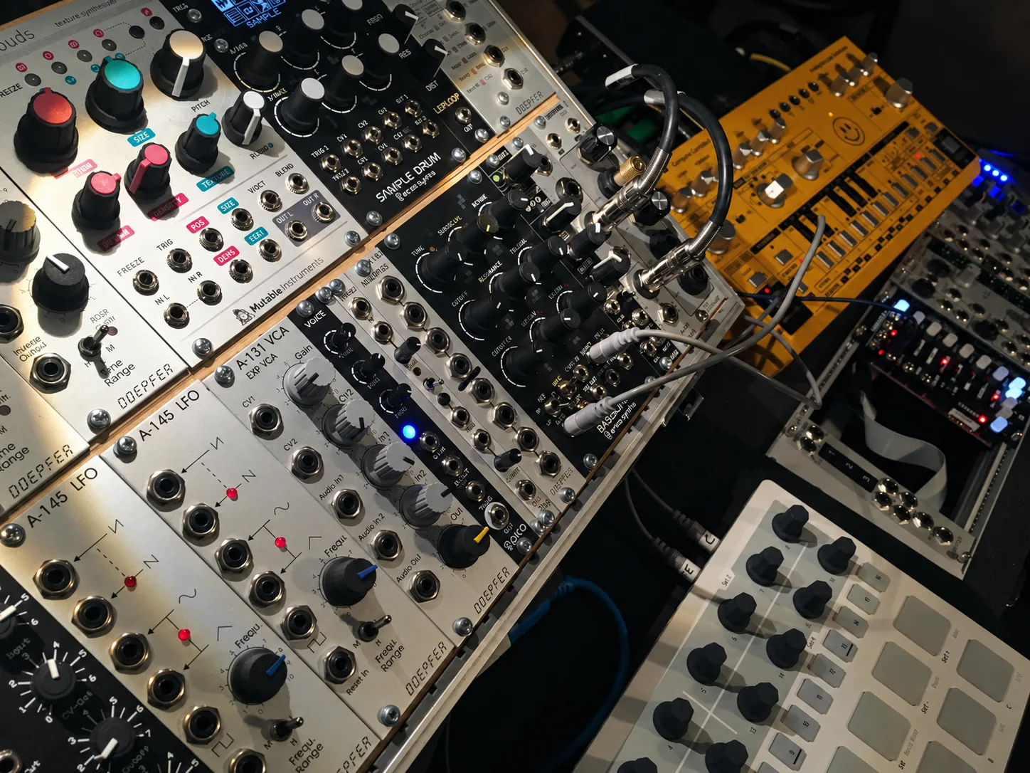 Modular synthesizer with bass synthesizer and controller